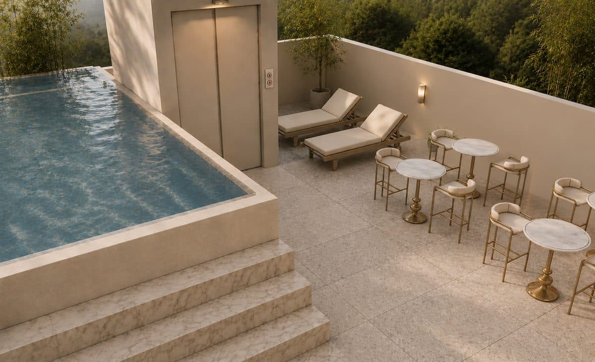 Rooftop pool set above the treeline, open toward the lake and hills